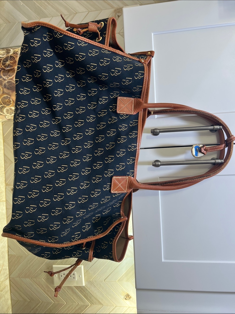 Dooney & Bourke Black Tote with Brown Leather Trim and Gold Monogram Weekender